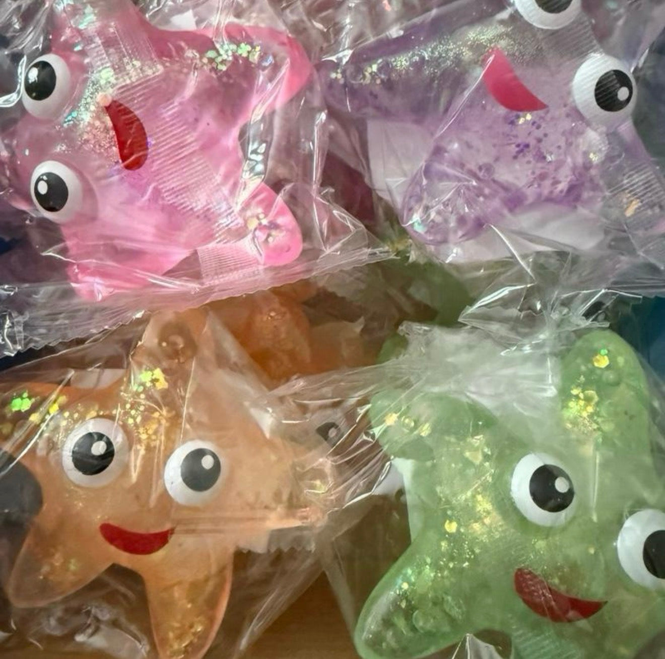 Glitter Squeeze Star - Colorful Character Design in Clear Packaging